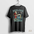 Official Fishing Santa Claus Reeling In The Season Merry Christmas Shirt