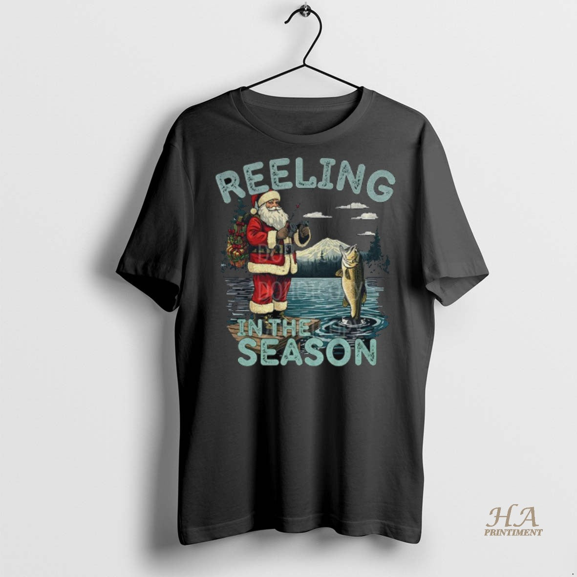 Official Fishing Santa Claus Reeling In The Season Merry Christmas Shirt