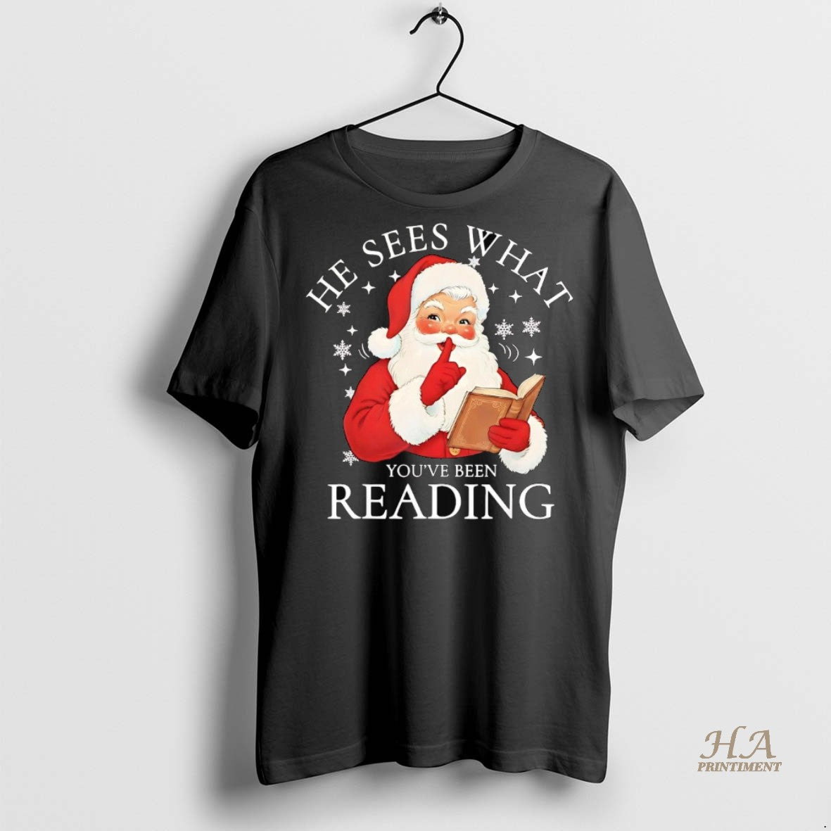 Official Santa He Sees What Youve Been Reading Christmas Shirt