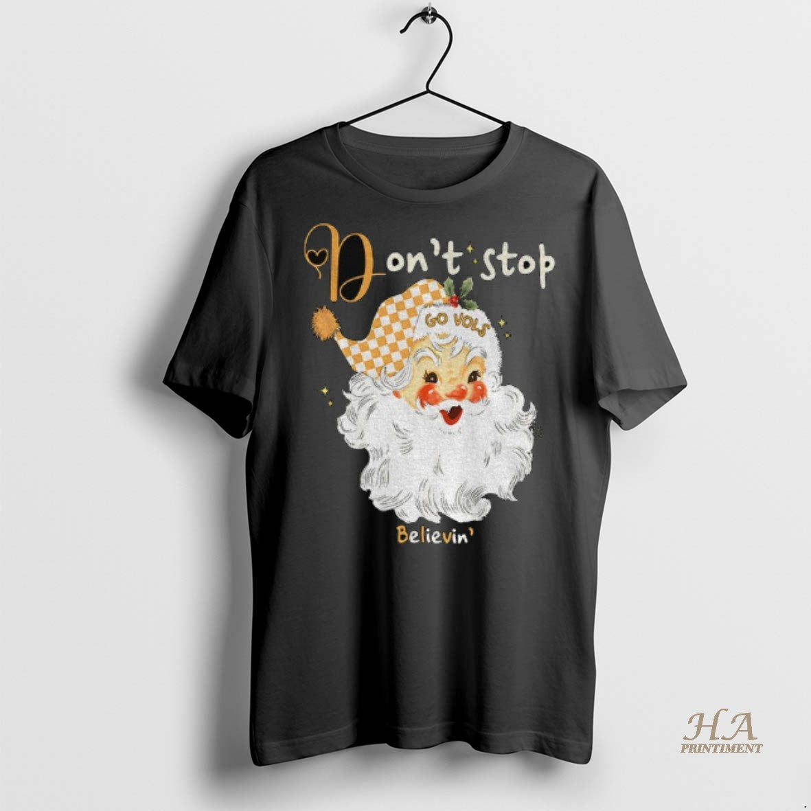 Official Tennessee Volunteers Santa Claus Dont Stop Go Vols Believin Merry Christmas Shirt
