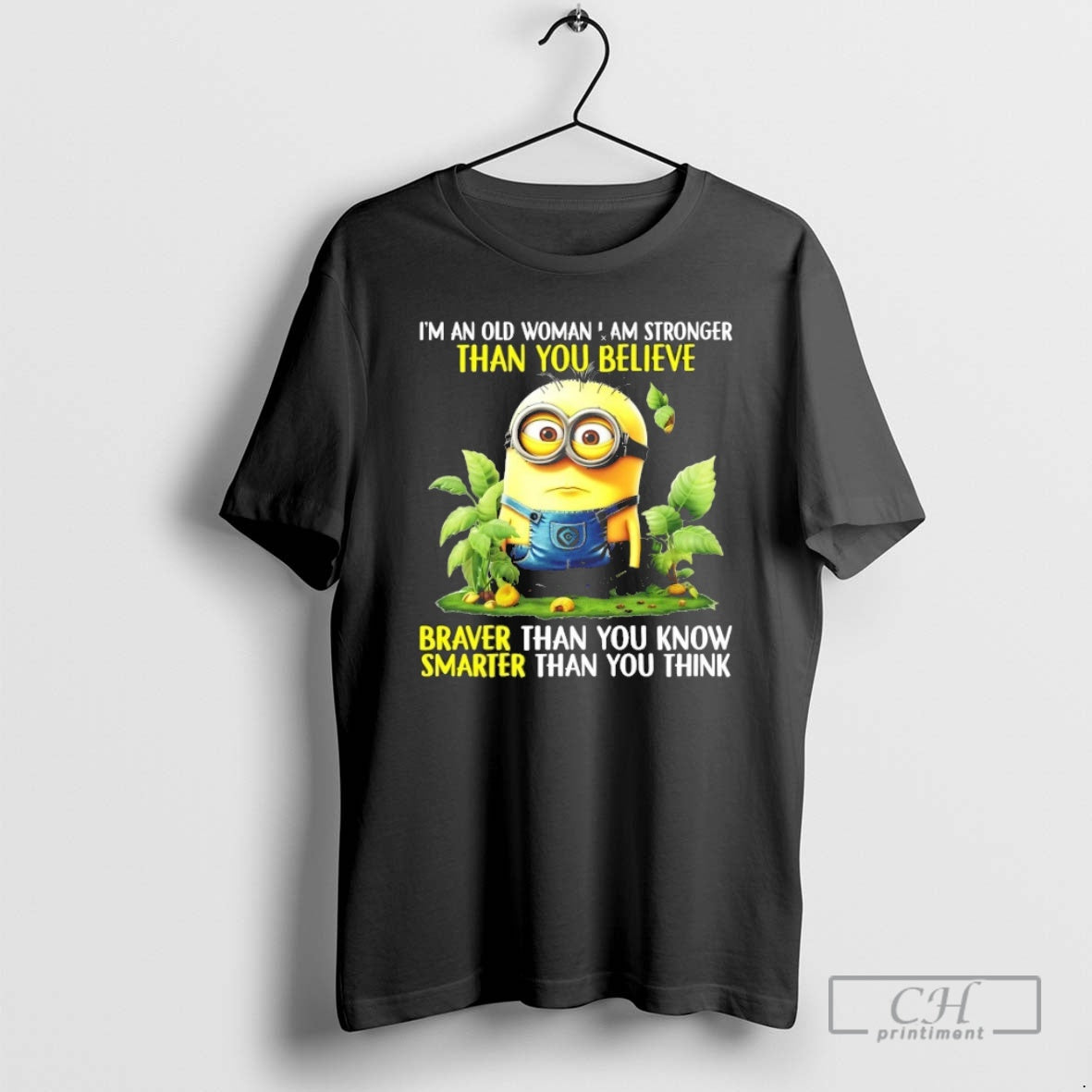 Premium Minion Im An Old Woman I Am Stronger Than You Believe Shirt Sweater