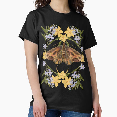 A moody and sophisticated botanical piece featuring a rich, dark-winged moth framed by elegant lavender and yellow blossoms. by Grin Katalina Floral Patterns & Cozy Art