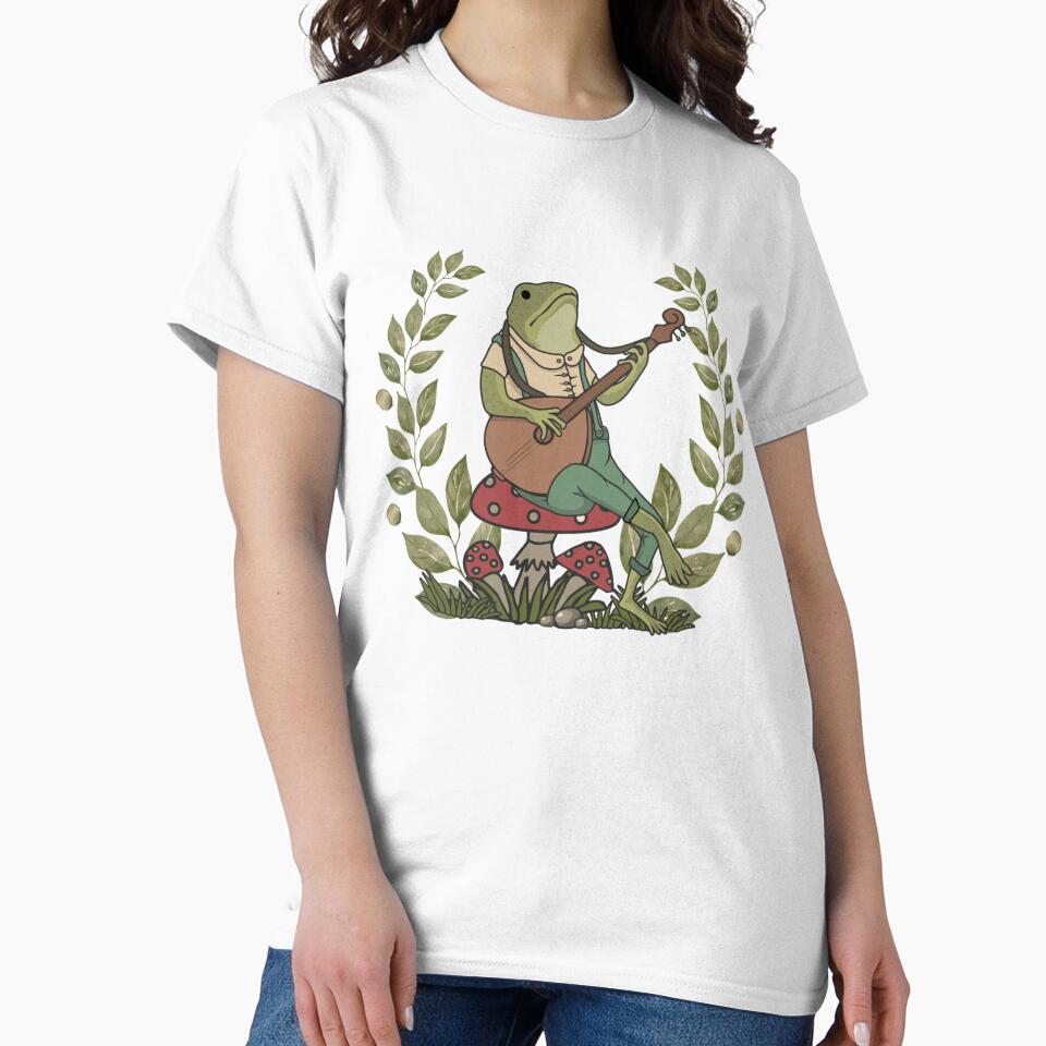 Cute frog cottagecore aesthetic. Frog playing a banjo sitting on a mushroom by HopItStudio