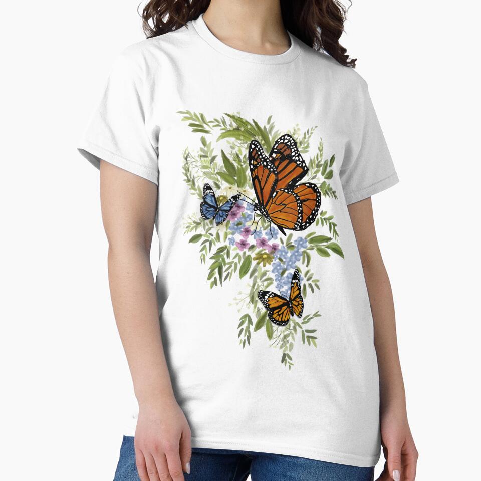 Monarch butterflies on wildflowers by Mariel Angel GJ